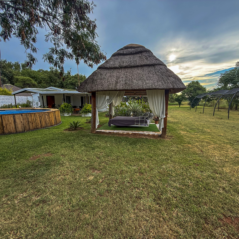 Outside Swing Bed and Splash Pool